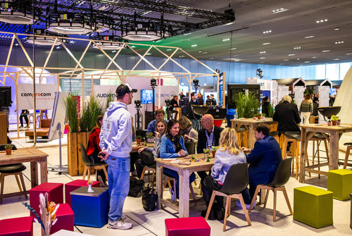 people in the workshop corner of the exhibition hall